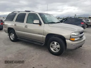 2001 Chevrolet Tahoe LS z VIN 1GNEC13T81R152119, wystawiony jako Copart lot #51171165 z przebiegiem 191 740 mil mil oraz Czysty tytuł • Clean title. Historia ofert i sprzedaży dostępna na DreamBid. Obrazek 4.