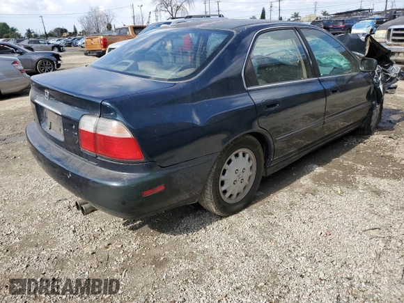 1997 Honda Accord EX with VIN 1HGCD5668VA262569, listed as a Copart auction lot 44713835 with 261,346 mi miles and Salvage Title. Bid and sale history available at DreamBid. Image 3.