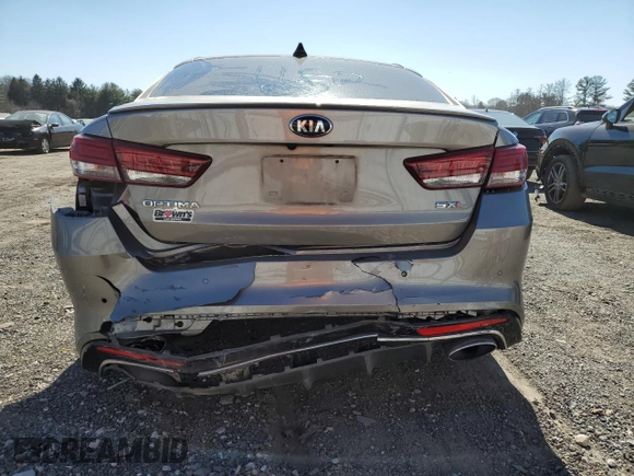 2018 Kia Optima SX with VIN 5XXGV4L21JG239044, listed as a Copart auction lot 50591675 with 183,071 mi miles and Salvage title. Bid and sale history available at DreamBid. Image 6.