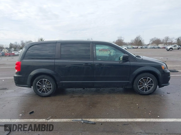 2015 Dodge Grand Caravan SE with VIN 2C4RDGBG8FR669355, listed as a IAAI auction lot 41486867 with 189,650 mi miles and . Bid and sale history available at DreamBid. Image 13.
