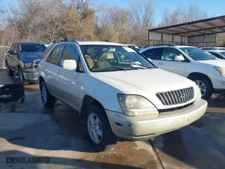 1999 Lexus RX 300 Luxury SUV with VIN JT6GF10U2X0025988, listed as a IAAI auction lot 41760039 with 248,121 mi miles. Bid and sale history available at carsss.com. Image 1.