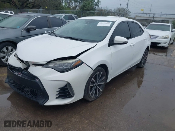 2017 Toyota Corolla L z VIN 2T1BURHE8HC764049, wystawiony jako IAAI lot #41653699 z przebiegiem 401 813 mil mil oraz . Historia ofert i sprzedaży dostępna na DreamBid. Obrazek 2.