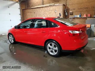 2014 Ford Focus SE with VIN 1FADP3F2XEL306920, listed as a Copart auction lot 52085415 with 123,495 mi miles and Salvage Title. Bid and sale history available at carsss.com. Image 2.