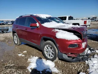 2014 Jeep Cherokee Latitude with VIN 1C4PJMCSXEW266324, listed as a Copart auction lot 49708415 with 140,961 mi miles and Salvage Title. Bid and sale history available at DreamBid. Image 4.