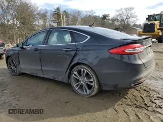 2017 Ford Fusion Titanium with VIN 3FA6P0D94HR183550, listed as a Copart auction lot 46148595 with 140,505 mi miles and Salvage title. Bid and sale history available at DreamBid. Image 2.