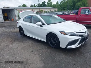 2023 Toyota Camry TRD z VIN 4T1KZ1AK8PU073362, wystawiony jako IAAI lot #42244183 z przebiegiem 103 245 mil mil oraz . Historia ofert i sprzedaży dostępna na DreamBid. Obrazek 1.