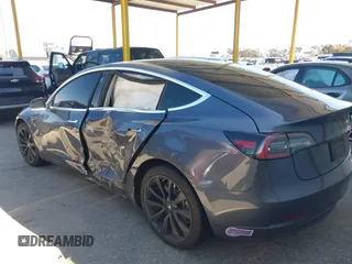 2018 Tesla Model 3 Long Range Battery with VIN 5YJ3E1EA7JF163401, listed as a IAAI auction lot 41829681 with 90,065 mi miles. Bid and sale history available at carsss.com. Image 13.