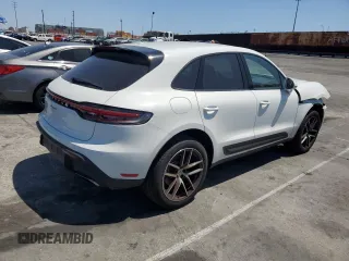 2025 Porsche Macan z VIN WP1AA2A58SLB01343, wystawiony jako Copart lot #54007455 z przebiegiem 1 415 mil mil oraz Szkoda całkowita • Salvage title. Historia ofert i sprzedaży dostępna na DreamBid. Obrazek 3.