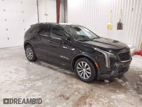 2020 Cadillac XT4 AWD Sport with VIN 1GYFZFR43LF090264, listed as a IAAI auction lot 41261586 with 65,859 mi miles and . Bid and sale history available at DreamBid. Image 1.