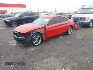 2014 BMW 4 Series 428i xDrive with VIN WBA3N9C57EK245350, listed as a IAAI auction lot 42184111 with 127,908 mi miles and . Bid and sale history available at DreamBid. Image 2.