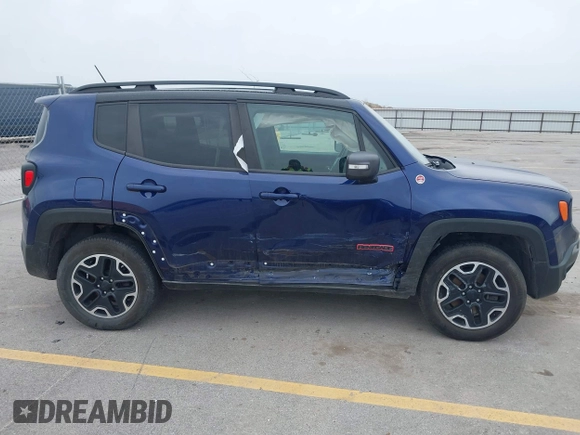 2016 Jeep Renegade Trailhawk with VIN ZACCJBCTXGPD30986, listed as a IAAI auction lot 41970876 with 55,814 mi miles and . Bid and sale history available at carsss.com. Image 13.