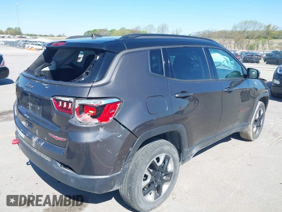 2019 Jeep Compass Trailhawk with VIN 3C4NJDDB0KT619337, listed as a IAAI auction lot 42171160 with 63,869 mi miles and . Bid and sale history available at DreamBid. Image 4.
