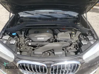 2017 BMW X1 xDrive28i z VIN WBXHT3C39H5F72979, wystawiony jako Copart lot #56003625 z przebiegiem 101 184 mil mil oraz Szkoda całkowita • Salvage title. Historia ofert i sprzedaży dostępna na DreamBid. Obrazek 12.