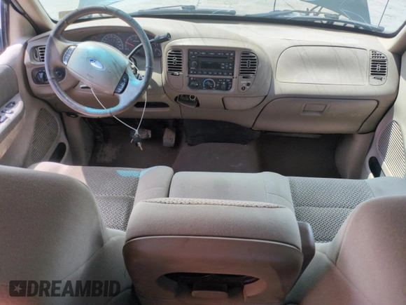 2003 Ford F-150 XL with VIN 2FTRX172X3CA58789, listed as a Copart auction lot 57986695 with 160,124 mi miles and Salvage title. Bid and sale history available at DreamBid. Image 8.