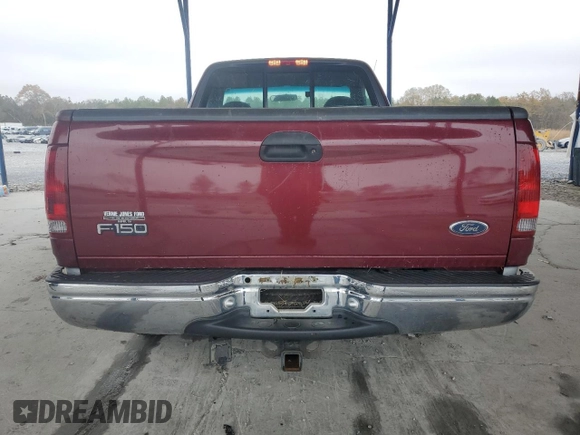 1999 Ford F-150 XL with VIN 2FTRF17L0XCB19827, listed as a Copart auction lot 85282164 with 52,103 mi miles and Salvage title. Bid and sale history available at DreamBid. Image 6.