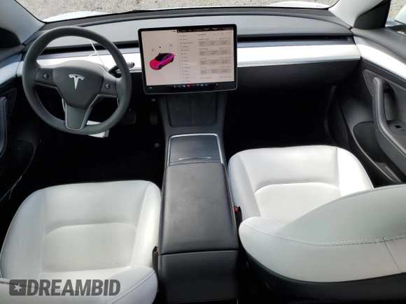2023 Tesla Model 3 with VIN 5YJ3E1EA9PF569835, listed as a Copart auction lot 50876824 with 25,736 mi miles and Salvage Title. Bid and sale history available at DreamBid. Image 8.