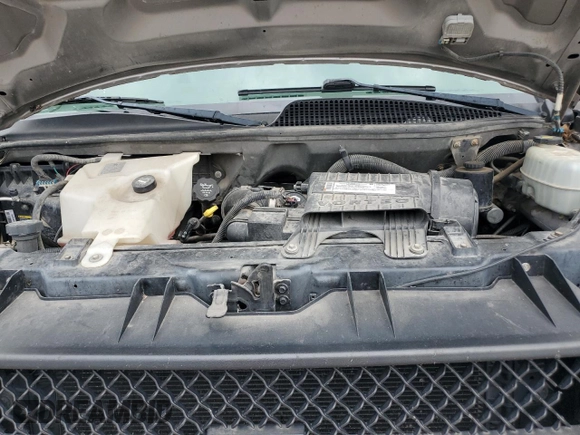 2007 Chevrolet Express Passenger with VIN 1GAHG39U771237121, listed as a Copart auction lot 60245775 with 187,005 mi miles and Salvage title. Bid and sale history available at DreamBid. Image 12.