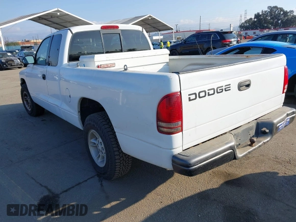 2002 Dodge Dakota with VIN 1B7GL12X62S519941, listed as a IAAI auction lot 41459153 with 259,726 mi miles and . Bid and sale history available at carsss.com. Image 3.