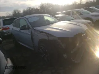 2022 BMW X4 M z VIN 5YM23EC05N9L05268, wystawiony jako Copart lot #81892214 z przebiegiem 37 163 mil mil oraz Szkody całkowita. Historia ofert i sprzedaży dostępna na DreamBid. Obrazek 4.
