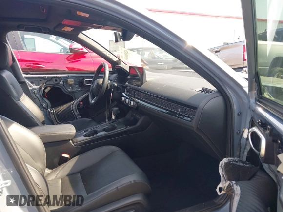 2022 Honda Civic Sport Touring z VIN 19XFL1H82NE003000, wystawiony jako IAAI lot #42020685 z przebiegiem 46 740 mil mil oraz . Historia ofert i sprzedaży dostępna na DreamBid. Obrazek 5.
