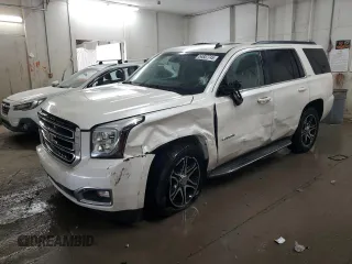 2015 GMC Yukon SLT z VIN 1GKS1BKC4FR249760, wystawiony jako Copart lot #54837745 z przebiegiem 139 169 mil mil oraz Szkoda całkowita • Salvage title. Historia ofert i sprzedaży dostępna na DreamBid. Obrazek 1.
