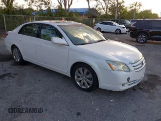 2005 Toyota Avalon XL with VIN 4T1BK36B85U004189, listed as a IAAI auction lot 41958147 with 166,720 mi miles. Bid and sale history available at carsss.com. Image 1.