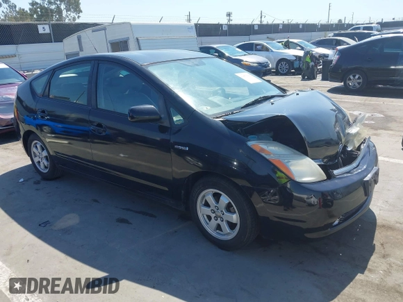 2007 Toyota Prius with VIN JTDKB20UX73228033, listed as a IAAI auction lot 41851668 with 242,138 mi miles. Bid and sale history available at carsss.com. Image 1.