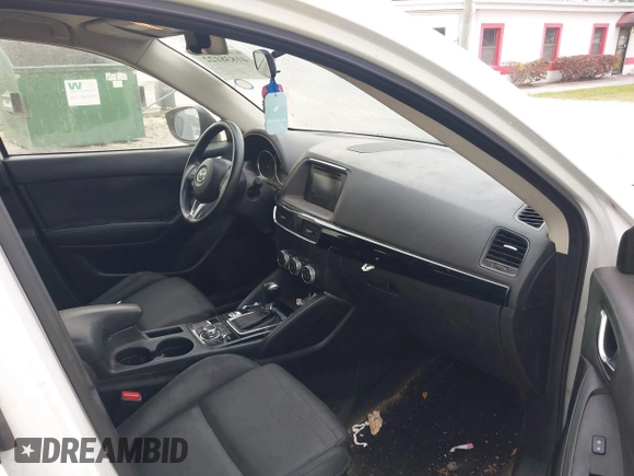 2016 Mazda CX-5 Sport with VIN JM3KE2BY1G0875484, listed as a IAAI auction lot 41838122 with 166,986 mi miles. Bid and sale history available at carsss.com. Image 5.