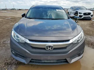 2018 Honda Civic EX-T with VIN JHMFC1F35JX018879, listed as a Copart auction lot 58633655 with 129,906 mi miles and Salvage title. Bid and sale history available at DreamBid. Image 5.