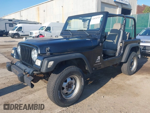 2004 Jeep Wrangler SE with VIN 1J4FA29144P797861, listed as a IAAI auction lot 42624721 with 156,867 mi miles and . Bid and sale history available at DreamBid. Image 2.