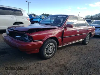 1989 Toyota Camry LE ECT z VIN JT2SV22E5K0253163, wystawiony jako Copart lot #82913404 z przebiegiem 74 454 mil mil oraz Szkoda całkowita • Salvage title. Historia ofert i sprzedaży dostępna na DreamBid. Obrazek 1.