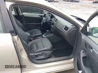 2014 Volkswagen Jetta TDI w/Premium/Nav with VIN 3VWLL7AJ9EM226026, listed as a IAAI auction lot 42219871 with 100,386 mi miles and . Bid and sale history available at DreamBid. Image 5.