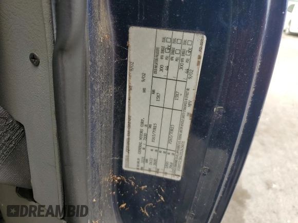 2002 Chevrolet Express z VIN 1GBFG15R421245601, wystawiony jako Copart lot #79137584 z przebiegiem 138 781 mil mil oraz Szkoda całkowita • Salvage title. Historia ofert i sprzedaży dostępna na DreamBid. Obrazek 13.