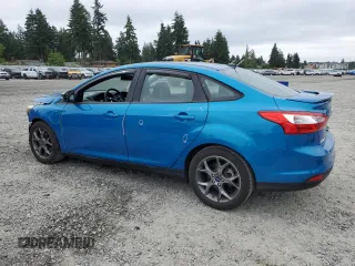 2013 Ford Focus SE with VIN 1FADP3F25DL295338, listed as a Copart auction lot 60225485 with 82,979 mi miles and Salvage title. Bid and sale history available at DreamBid. Image 2.