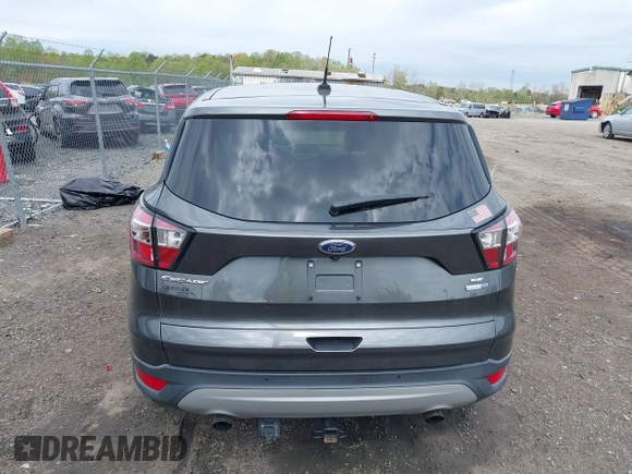 2017 Ford Escape SE with VIN 1FMCU9GD1HUC27843, listed as a IAAI auction lot 42009686 with 111,290 mi miles and . Bid and sale history available at DreamBid. Image 16.