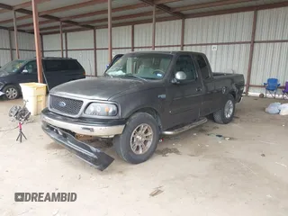 2002 Ford F-150 XL with VIN 1FTRX17242NB82159, listed as a IAAI auction lot 42283839 with 163,685 mi miles and . Bid and sale history available at DreamBid. Image 2.