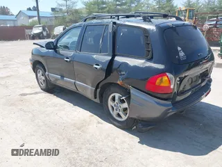2002 Hyundai Santa Fe GLS z VIN KM8SC73D42U281993, wystawiony jako IAAI lot #42098783 z przebiegiem 256 094 mil mil oraz . Historia ofert i sprzedaży dostępna na DreamBid. Obrazek 3.