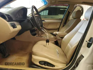 2004 BMW 3 Series 330xi with VIN WBAEW53474PG10944, listed as a Copart auction lot 52017375 with 216,654 mi miles and Clean Title. Bid and sale history available at carsss.com. Image 7.