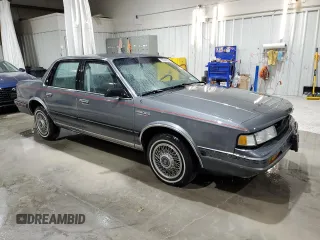 1991 Oldsmobile Cutlass Ciera with VIN 2G3AM54N8M2304905, listed as a Copart auction lot 52047535 with 28,749 mi miles and Salvage Title. Bid and sale history available at DreamBid. Image 4.