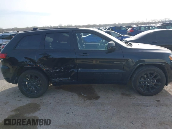 2018 Jeep Grand Cherokee Laredo E with VIN 1C4RJEAG4JC311699, listed as a IAAI auction lot 41876920 with 42,584 mi miles and . Bid and sale history available at DreamBid. Image 13.