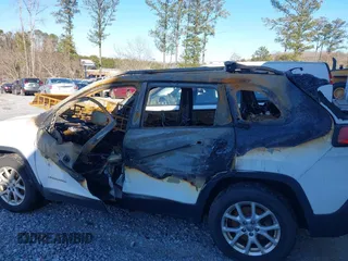 2014 Jeep Cherokee Altitude with VIN 1C4PJMCB5EW120946, listed as a IAAI auction lot 41348100 with Not Provided miles and . Bid and sale history available at DreamBid. Image 6.