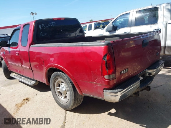 2002 Ford F-150 XL with VIN 1FTRX17W02KB40270, listed as a IAAI auction lot 42573017 with Not provided miles and . Bid and sale history available at DreamBid. Image 3.