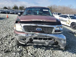 2000 Ford Expedition XLT with VIN 1FMRU166XYLA82466, listed as a Copart auction lot 42507135 with 214,014 mi miles and Salvage Title. Bid and sale history available at DreamBid. Image 5.