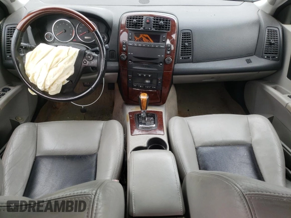 2006 Cadillac CTS with VIN 1G6DP577960116712, listed as a Copart auction lot 73001114 with 103,793 mi miles and Salvage Title. Bid and sale history available at carsss.com. Image 8.
