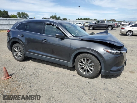 2019 Mazda CX-9 Touring with VIN JM3TCBCY0K0309947, listed as a Copart auction lot 56897815 with 87,517 mi miles and Salvage title. Bid and sale history available at DreamBid. Image 4.