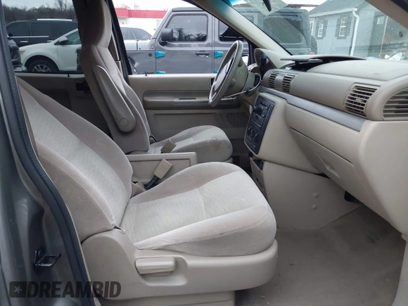2005 Ford Freestar SE z VIN 2FMZA51625BA54311, wystawiony jako IAAI lot #41120117 z przebiegiem 139 647 mil mil oraz . Historia ofert i sprzedaży dostępna na DreamBid. Obrazek 5.