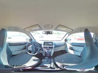2012 Scion iQ with VIN JTNJJXB05CJ010539, listed as a Copart auction lot 56489245 with 114,623 mi miles and Salvage title. Bid and sale history available at DreamBid. Image 14.