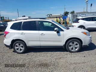 2014 Subaru Forester Touring with VIN JF2SJAPC4EH539193, listed as a IAAI auction lot 42444513 with 159,639 mi miles and . Bid and sale history available at DreamBid. Image 13.