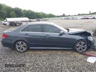 2014 Mercedes-Benz E 350 Sport with VIN WDDHF5KB7EA779952, listed as a IAAI auction lot 42308290 with 100,000 mi miles and . Bid and sale history available at DreamBid. Image 13.