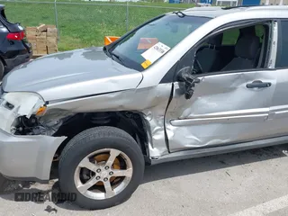 2007 Chevrolet Equinox LT z VIN 2CNDL63F376009994, wystawiony jako IAAI lot #42063338 z przebiegiem 176 656 mil mil oraz . Historia ofert i sprzedaży dostępna na DreamBid. Obrazek 6.